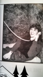 Everything about this picture dates me. I am talking on a landline phone, wearing a wrist watch. 