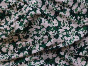 Black, green, and white print fabric.